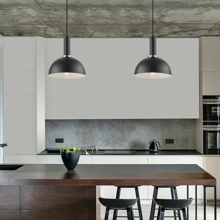 Two black dome pendants in kitchen 