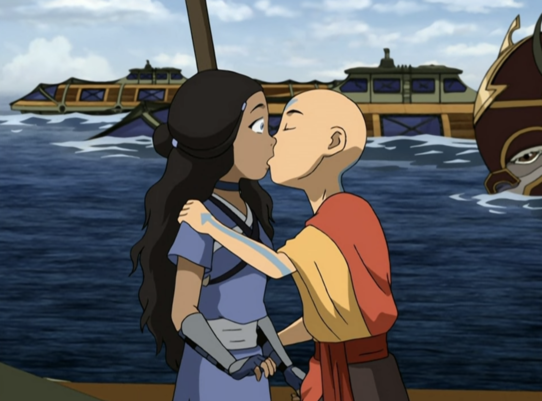 Aang kissing Katara, who&#x27;s leaning back with open eyes.