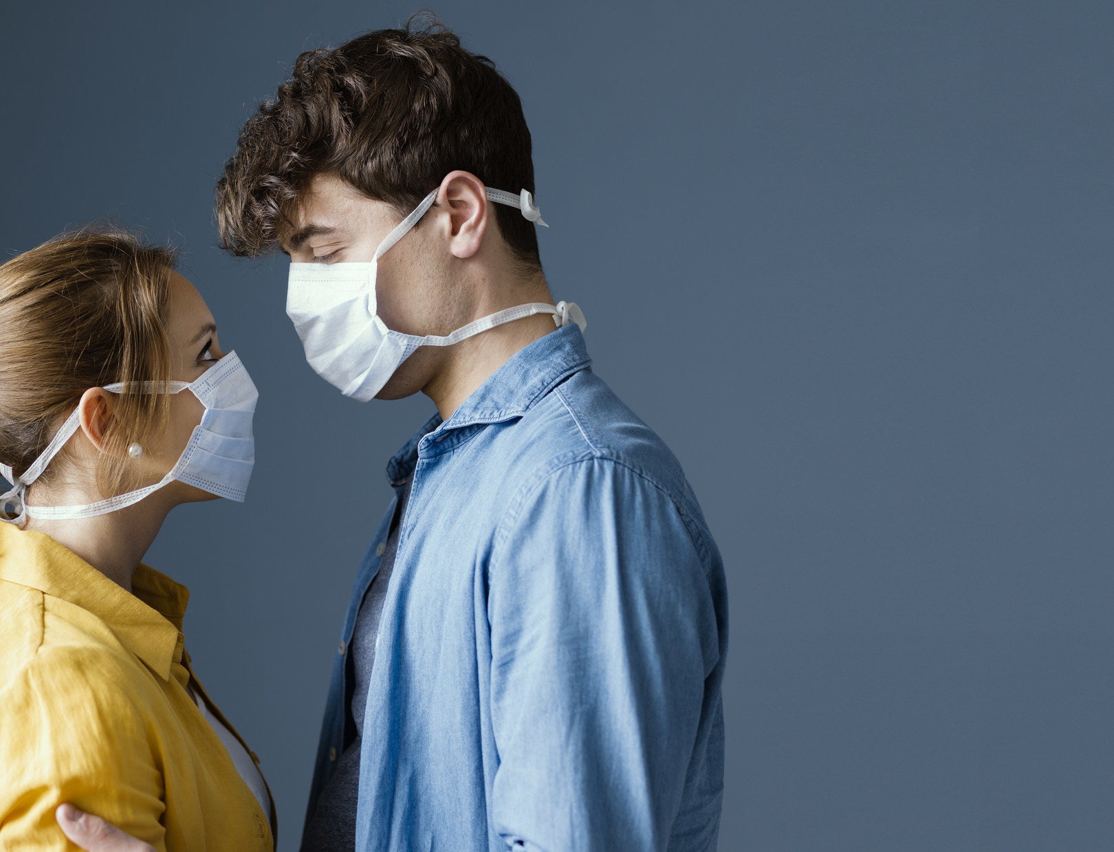 Photo of a couple wearing face masks