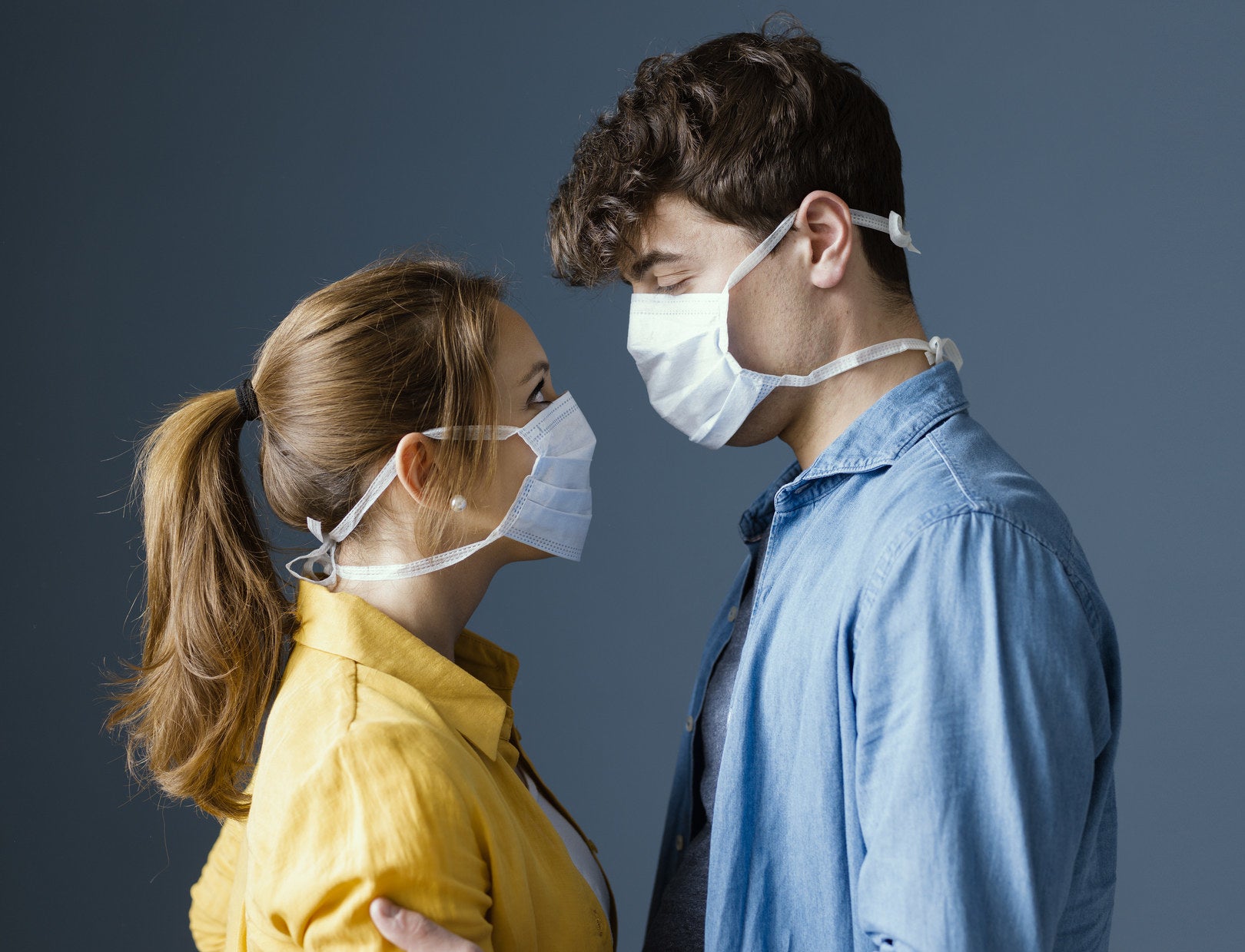 Photo of a couple wearing face masks