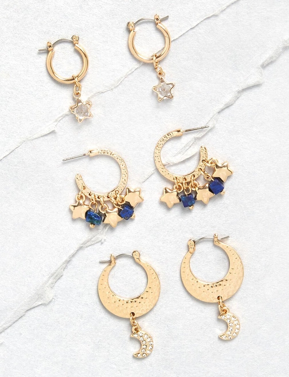 three pairs of faux gold earrings 