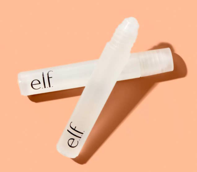 Two clear tubes of e.l.f. Cosmetics&#x27; Acne Fighting Spot Gel Treatment against a peach background