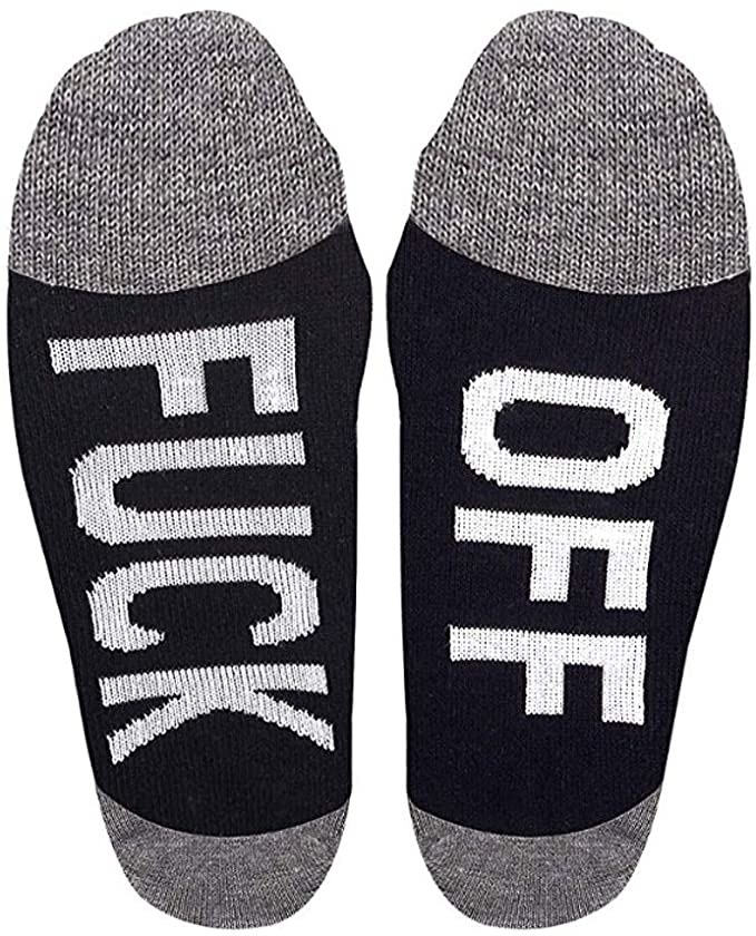 A pair of socks with writing on the sole one says fuck and the other says off