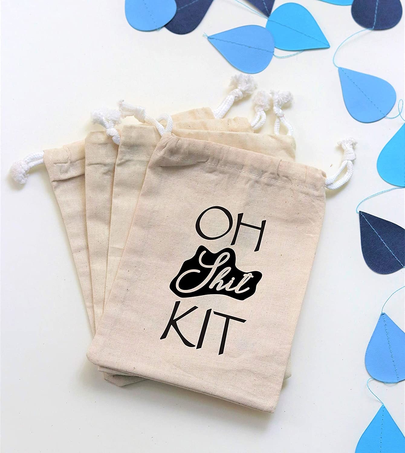 A drawstring bag that says oh shit kit
