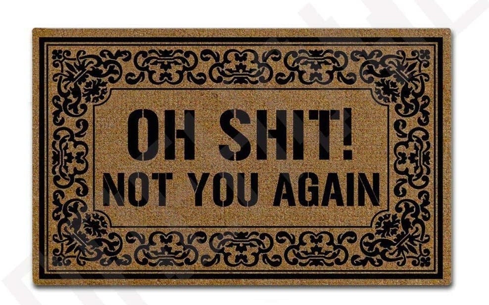 A doormat that says oh shit not your again 