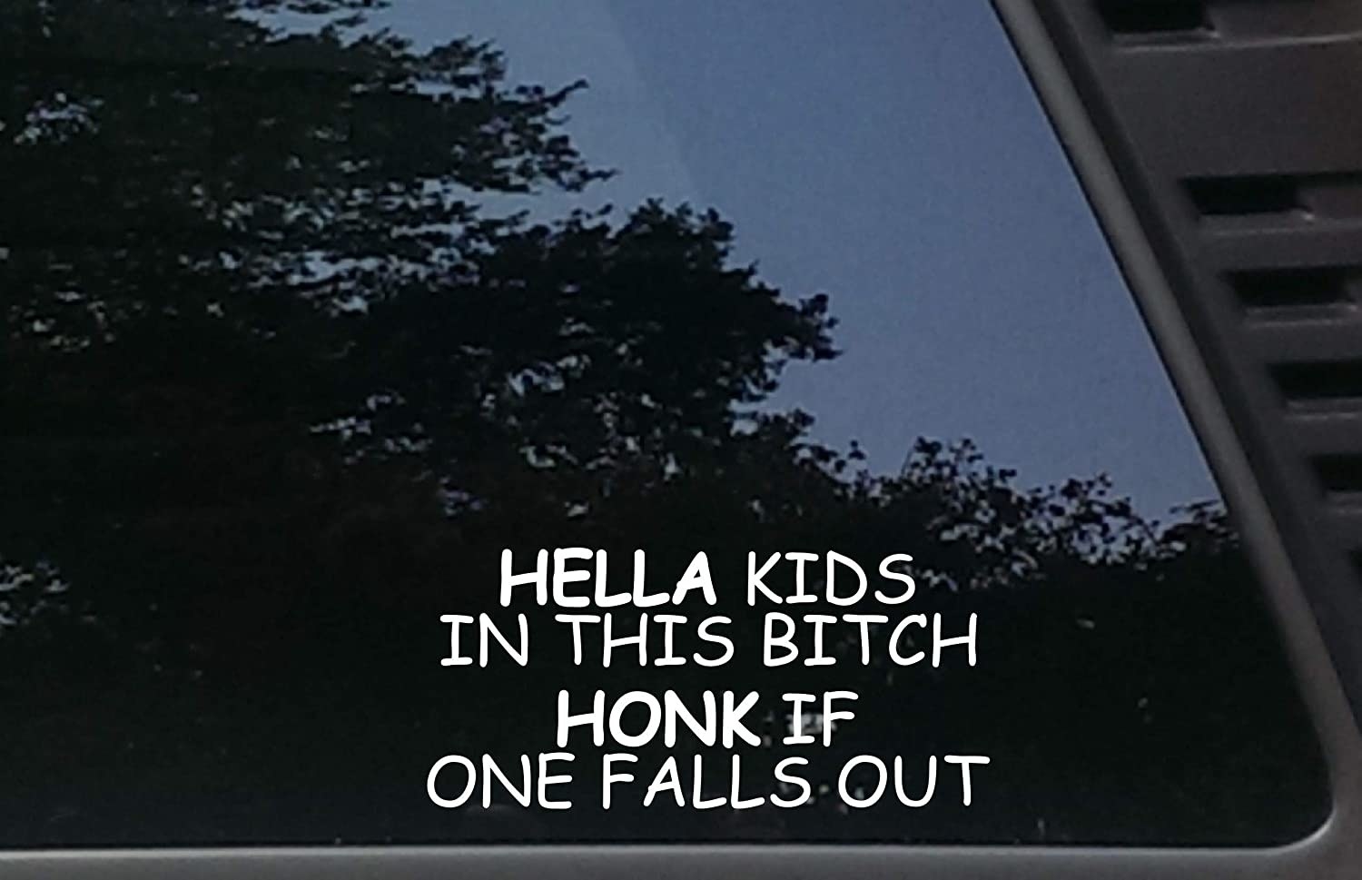 A decal on a car that says hella kids in this bitch honk if one falls out