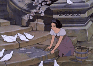 Snow White scrubs a row of stairs surrounded by white doves