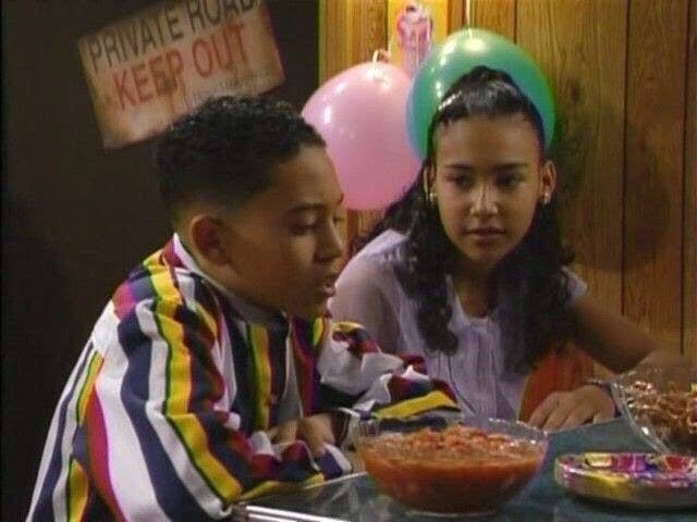 Tahj Mowry as TJ Henderson and Naya Rivera as one of his dates for a school dance in &quot;Smart Guy&quot;