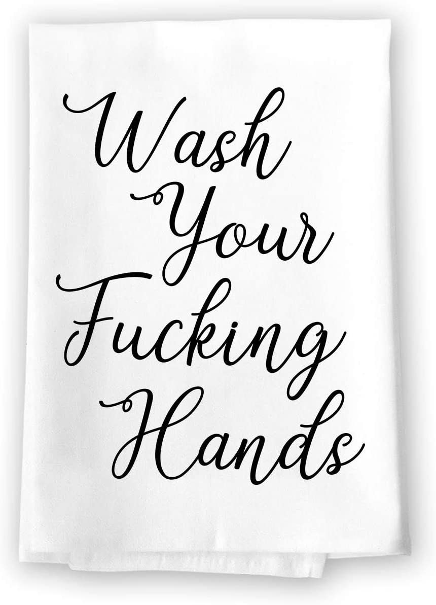A hand towel that says wash your fucking hands in cursive script