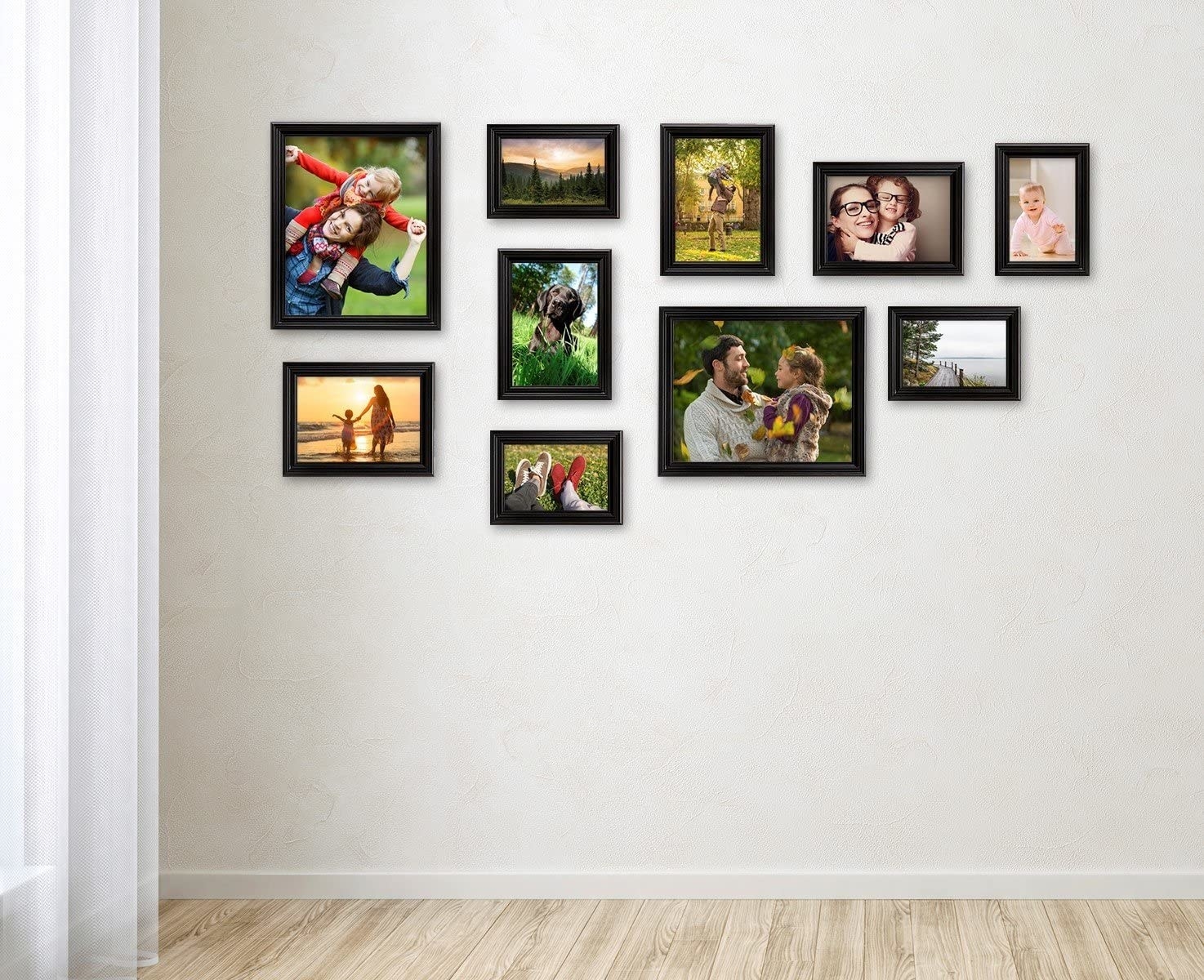 Multiple frames hung on a wall to make a gallery wall