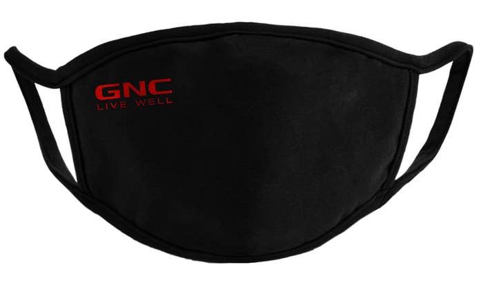 The black mask, which has a small red GNC logo in the top left corner