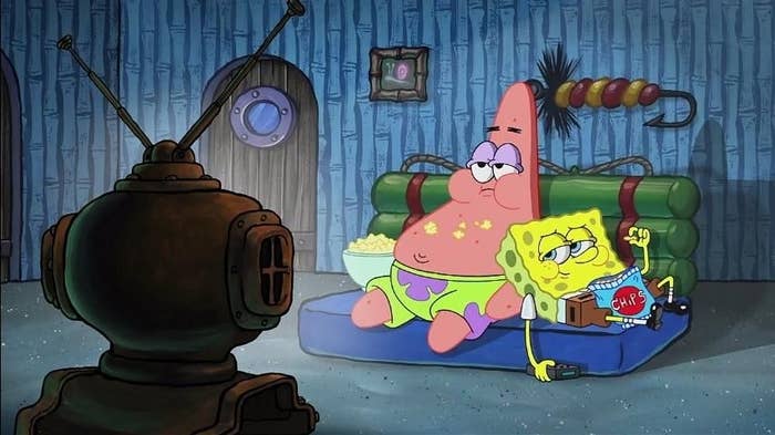 Spongebob and Patrick eating popcorn and watching TV