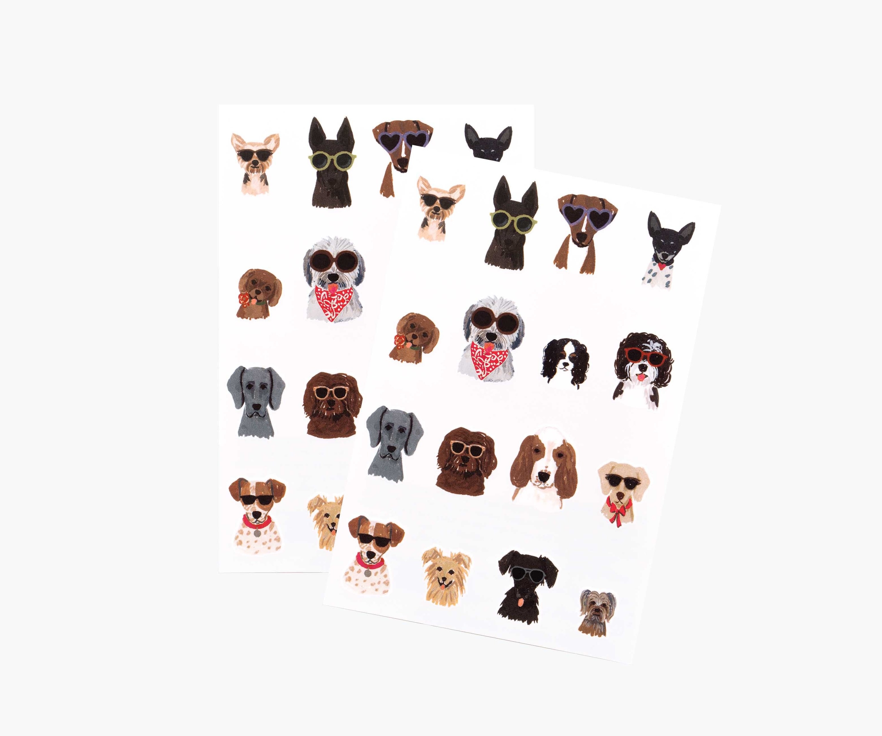 The two sheets of small tattoos of different breeds of dogs, some wearing sunglasses and some not