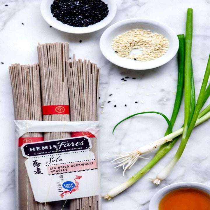 Buckwheat soba noodles, scallions, and sesame seeds for soba noodle stir fry.