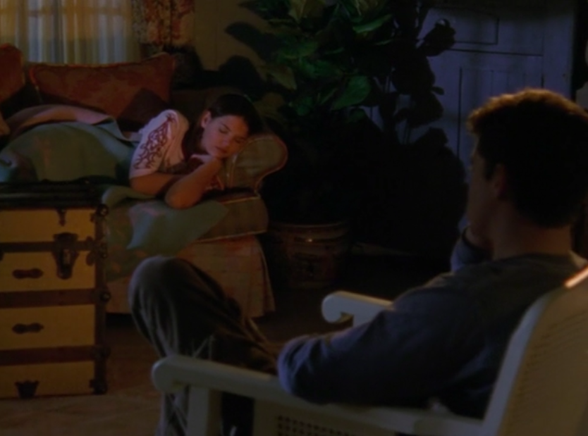 Pacey watches Joey sleep by the fire. 