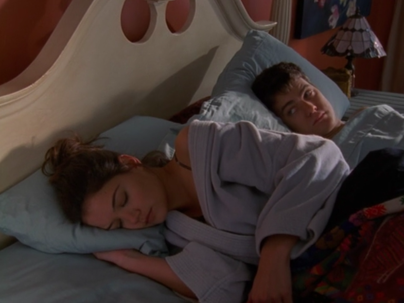 Joey and Pacey share a bed. 