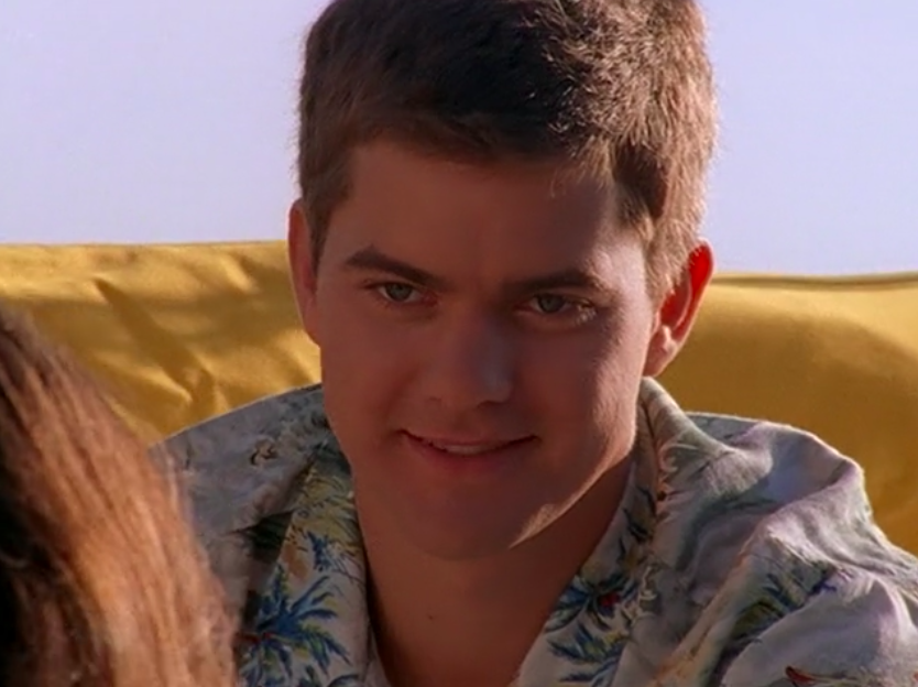 Pacey welcomes Joey onto the boat. 