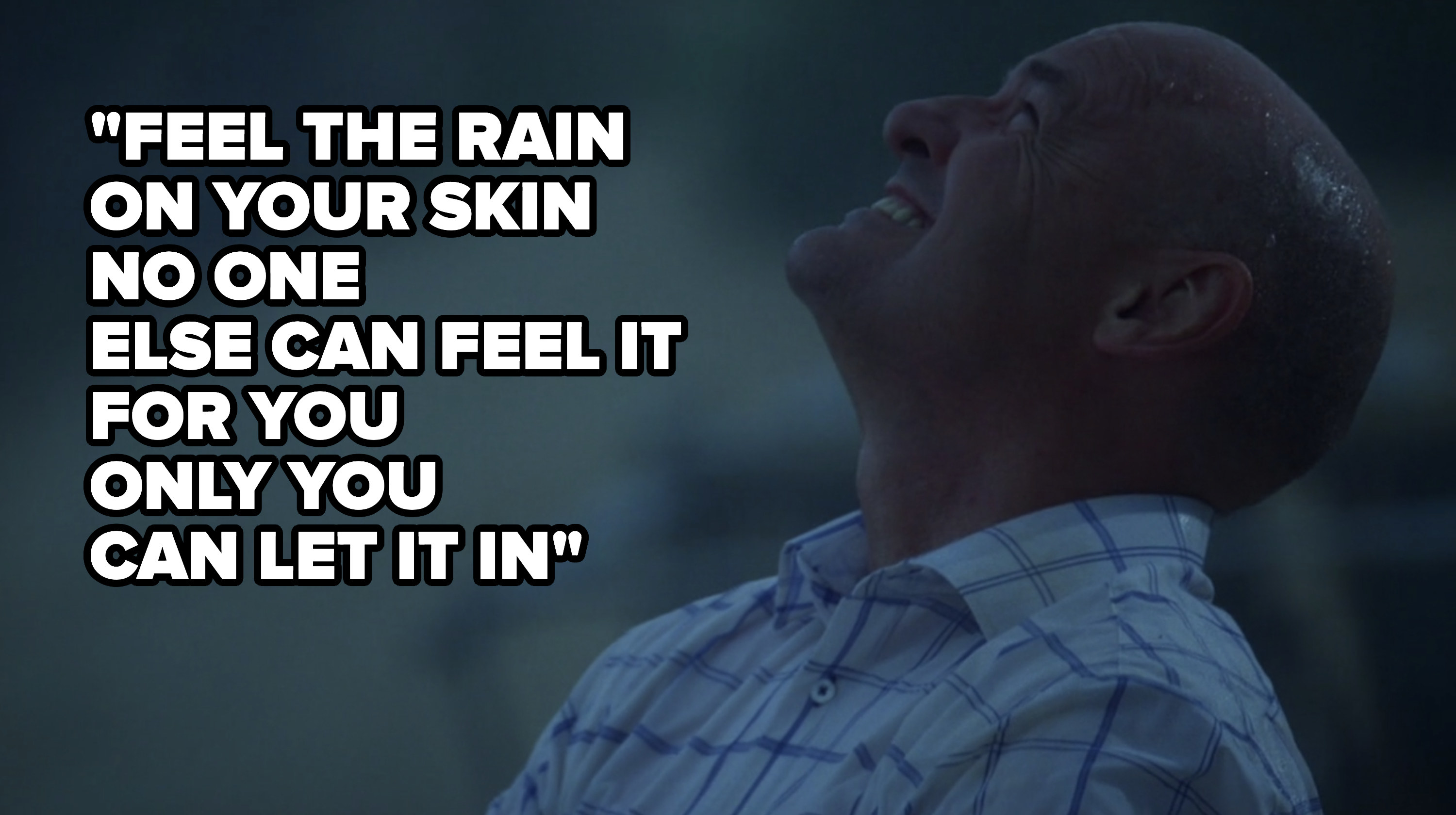 John Locke looking at the sky as the rain comes down on him