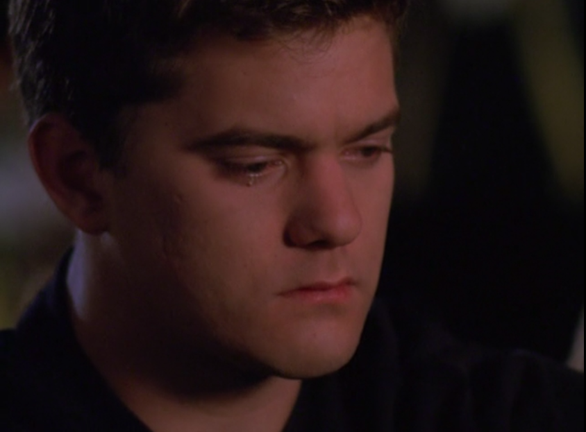 Pacey cries after Joey ends things. 