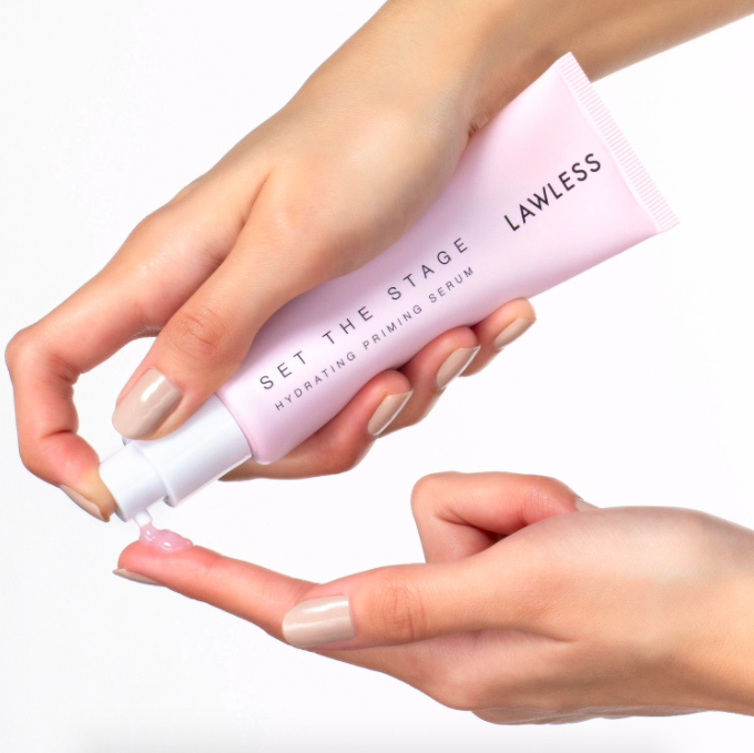 A model squeezes the Lawless hydrating priming serum onto their finger