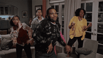 The Johnson family from &quot;Black-ish&quot; enjoying a family dance in the living room.