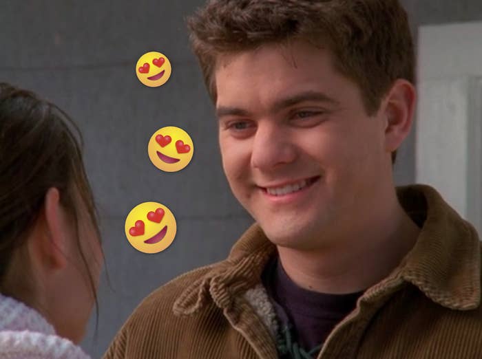 Pacey smiling at Joey with some heart eyes emojis on the photo.