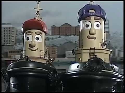 Two anthropomorphic tugboats with smiles on their faces