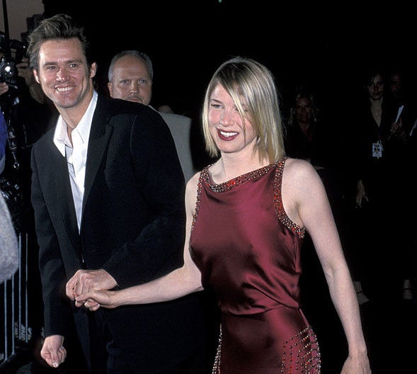 A red carpet photo of Jim Carrey and Renée Zellweger.