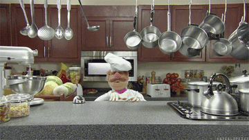 The Swedish Chef dancing in the kitchen 