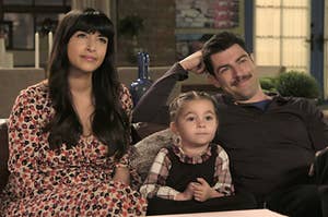 Cece and Schmidt from New Girl with their daughter Ruth 