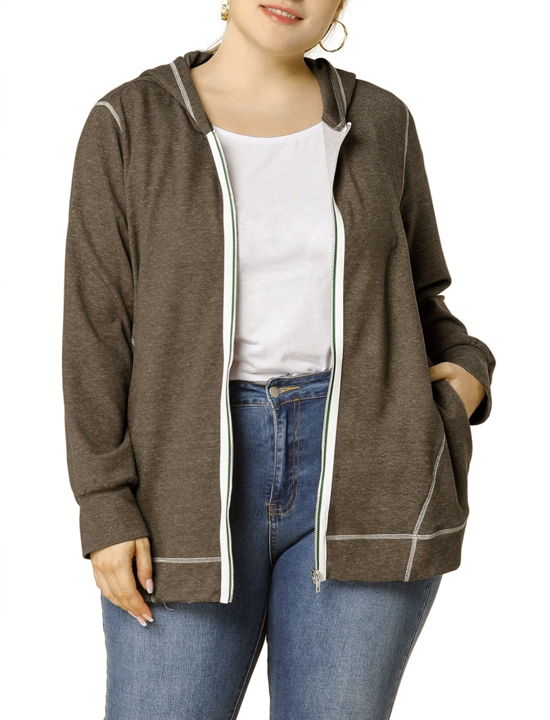Model in brown zip-up hoodie
