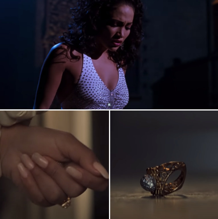 Selena is looking down on stage for one of the last times; cut to a wounded Selena in the ambulance, holding her ring, and the ring falls on the ground