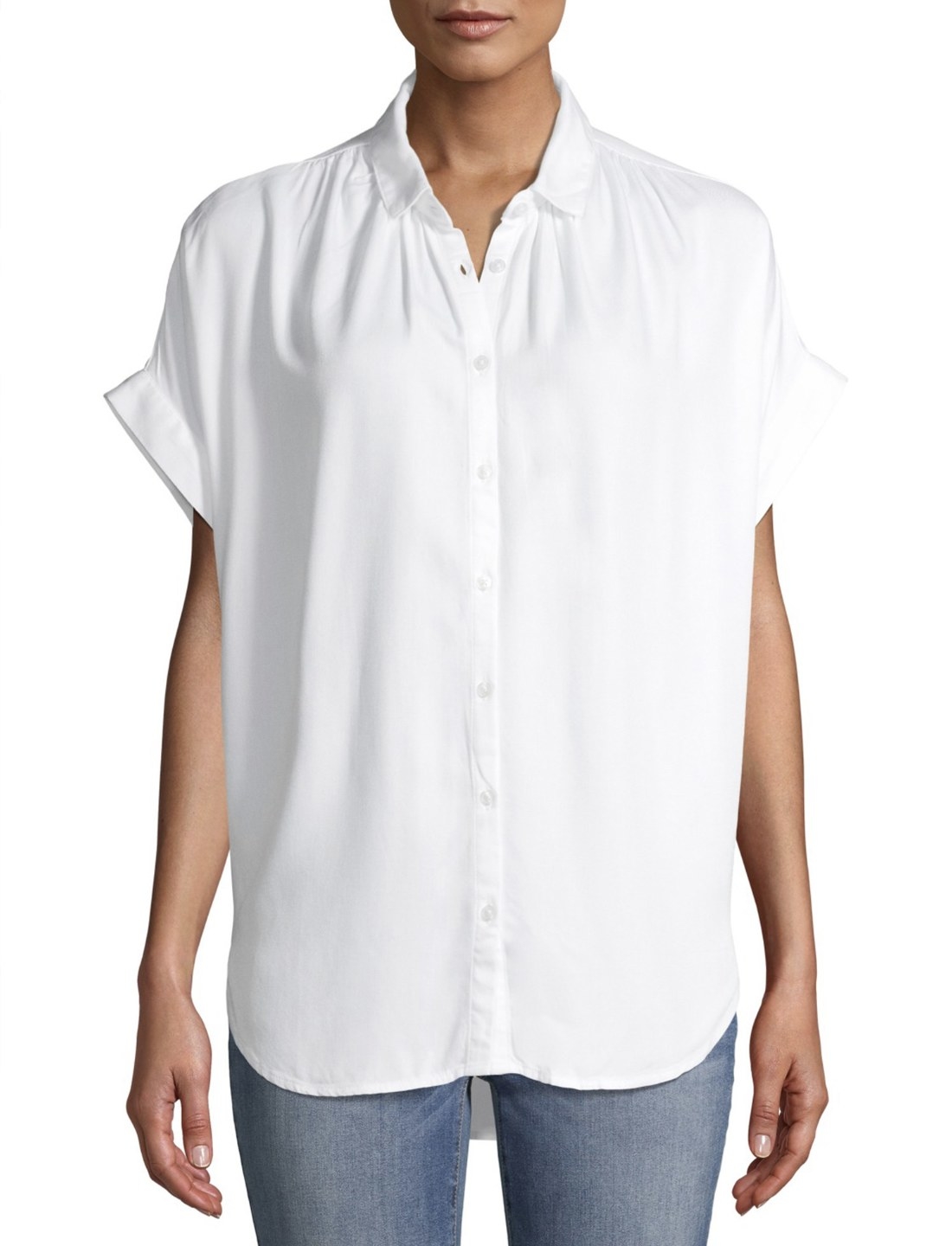 Model in the sleeveless white blouse