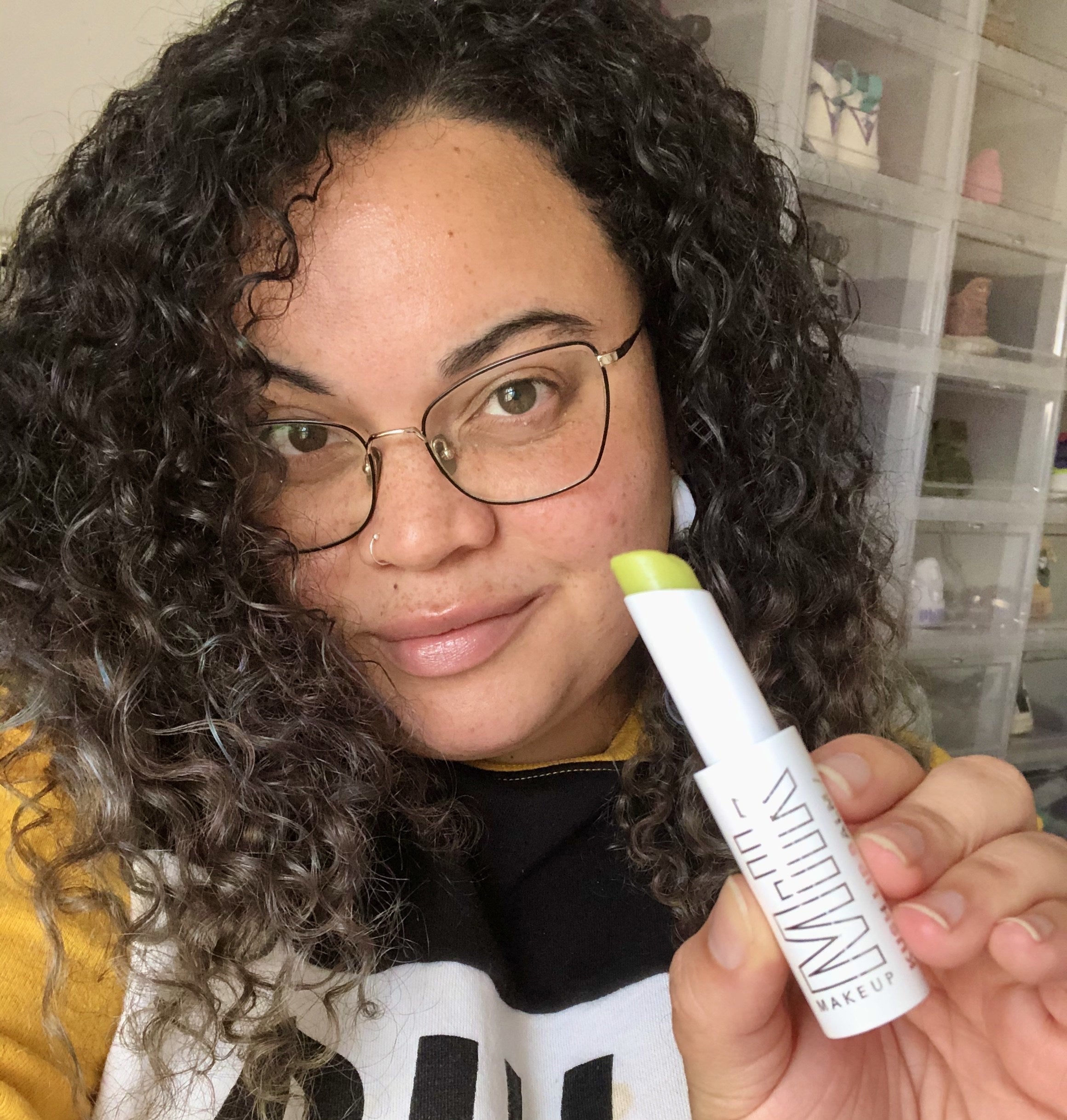 BuzzFeed Shopping editor wearing the clear lip balm