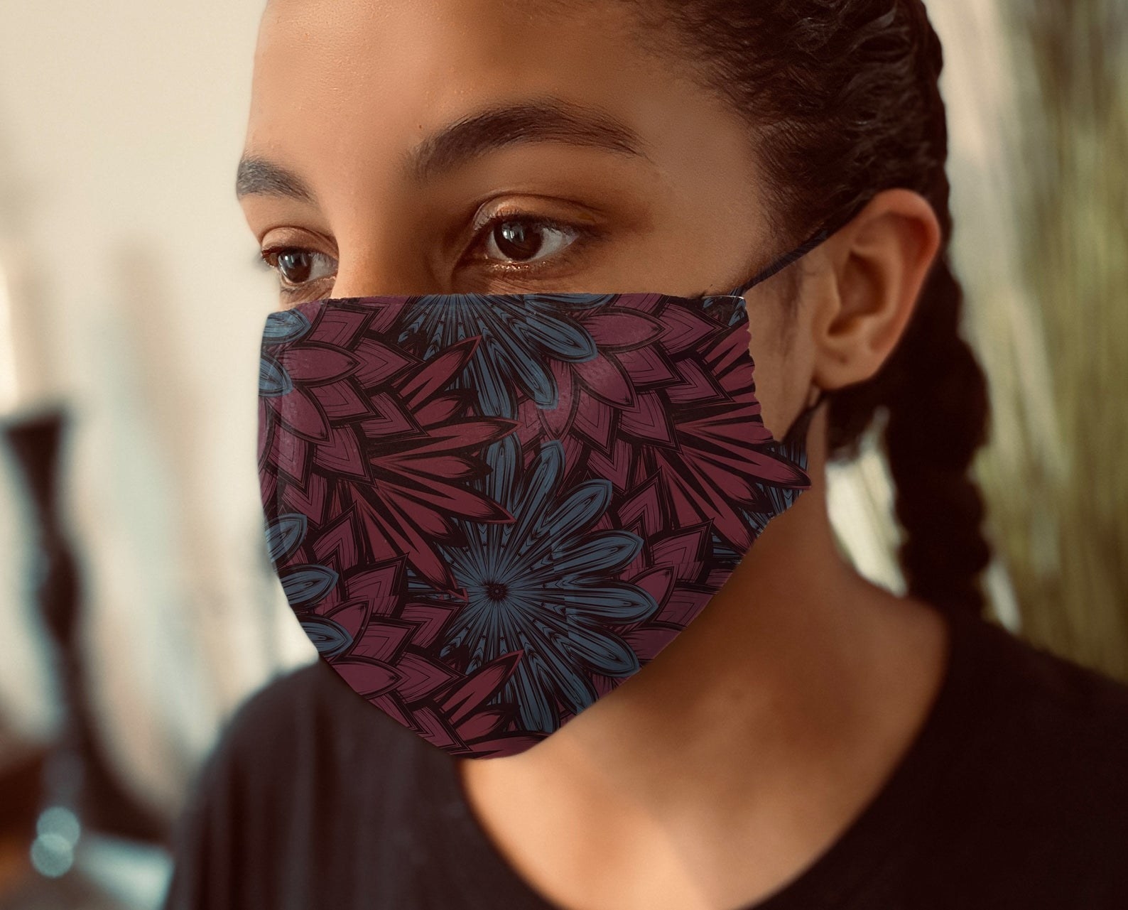 A model in a blue and navy floral mask 