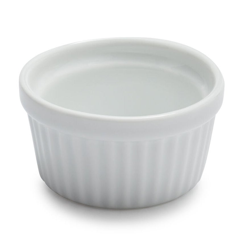 The white, round ramekin with a ribbed side