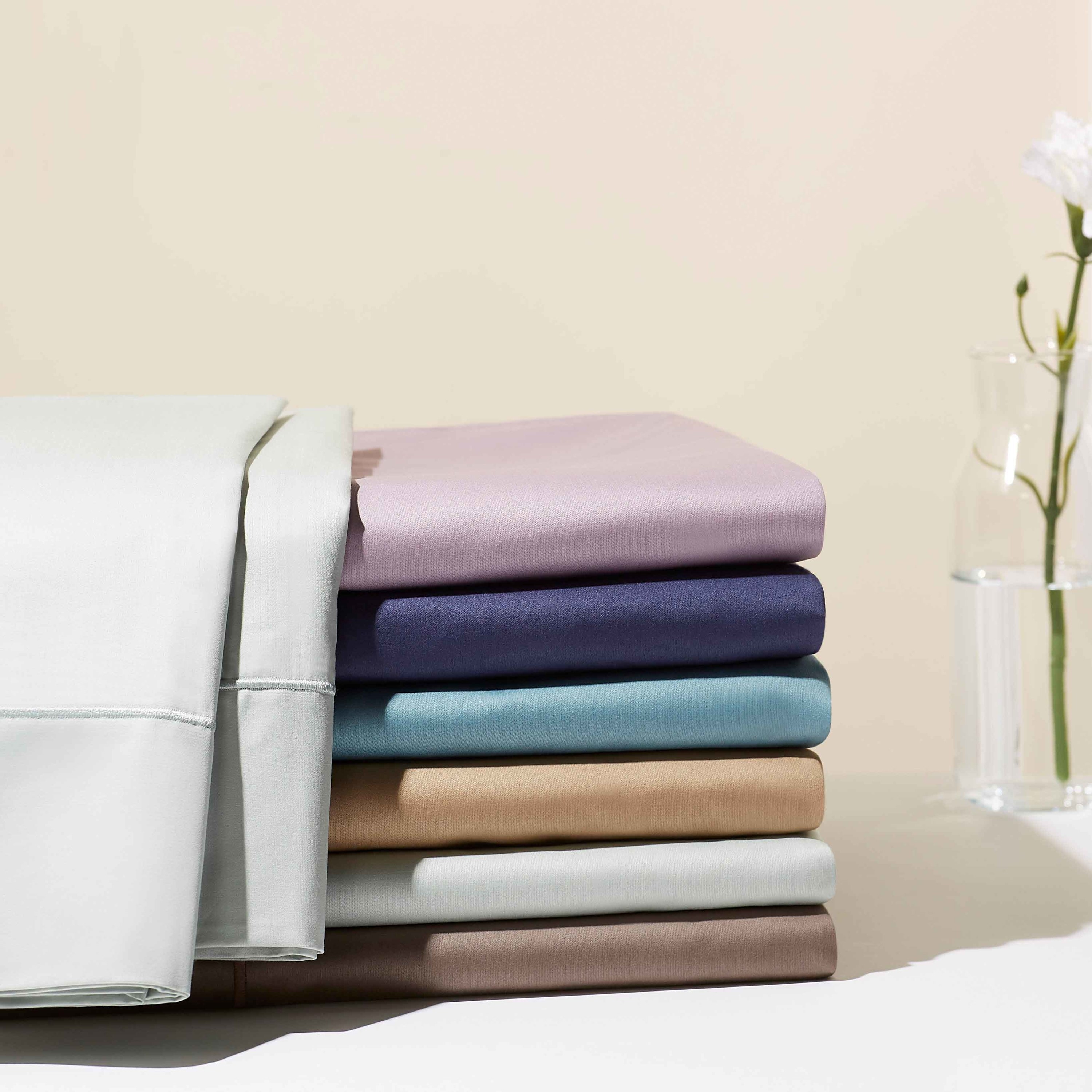 seven of the sheet sets in different colors