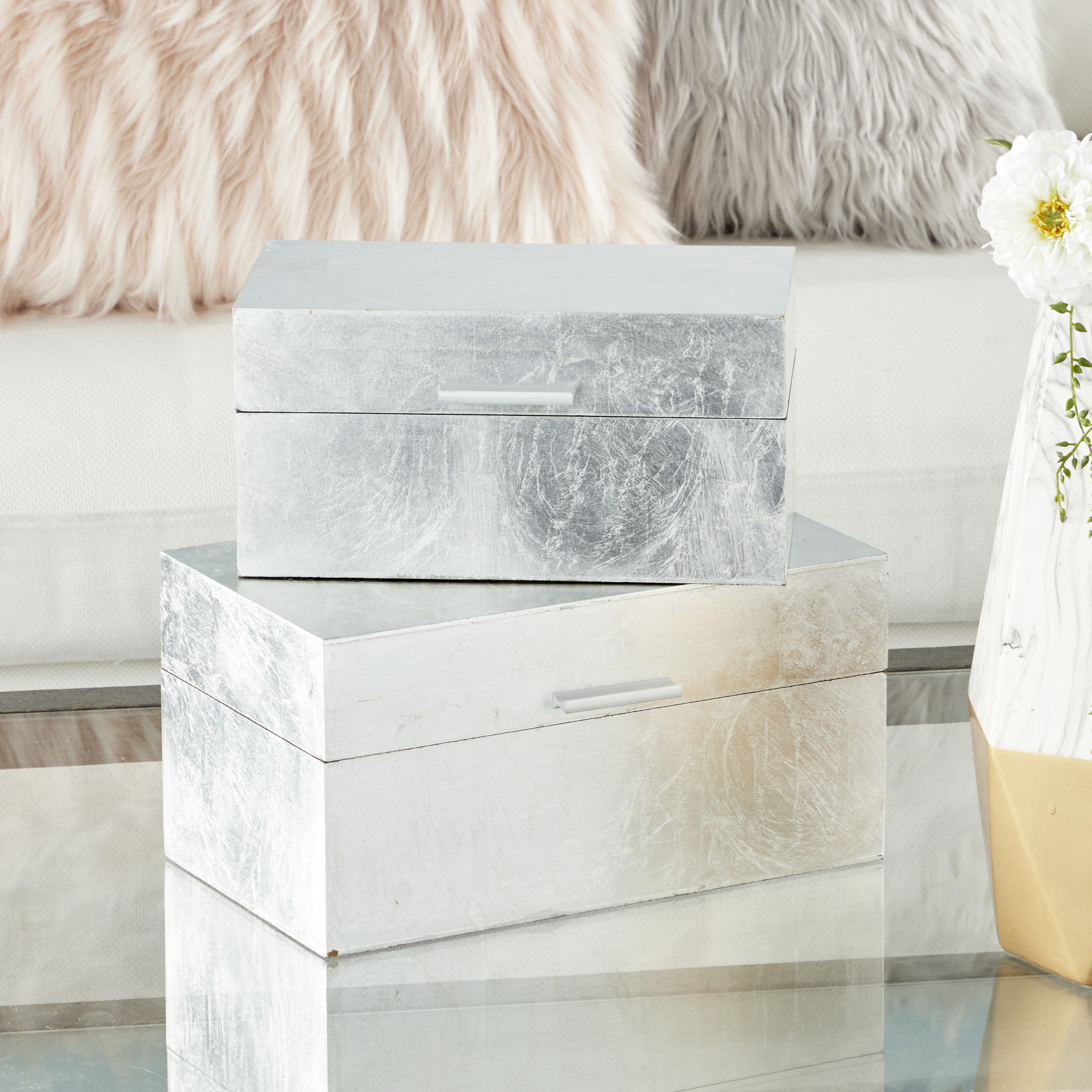 two silver leaf decorative boxes