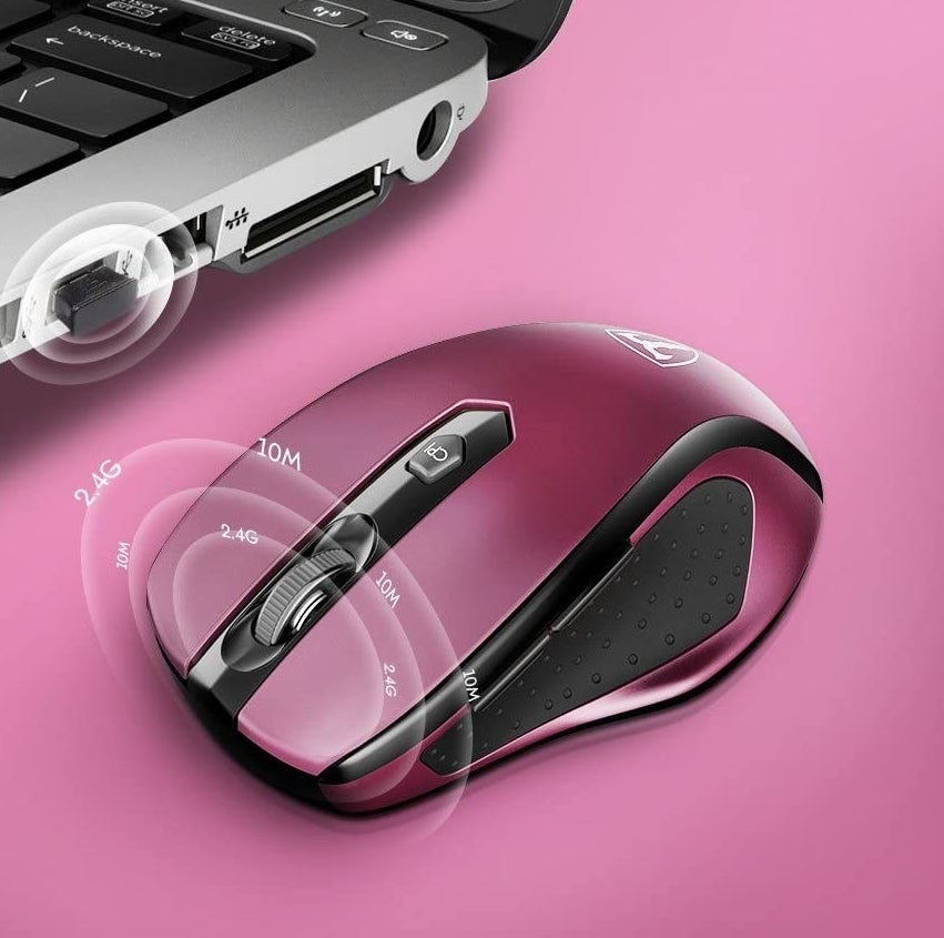 A wireless ergonomic mouse sending signals out to a computer
