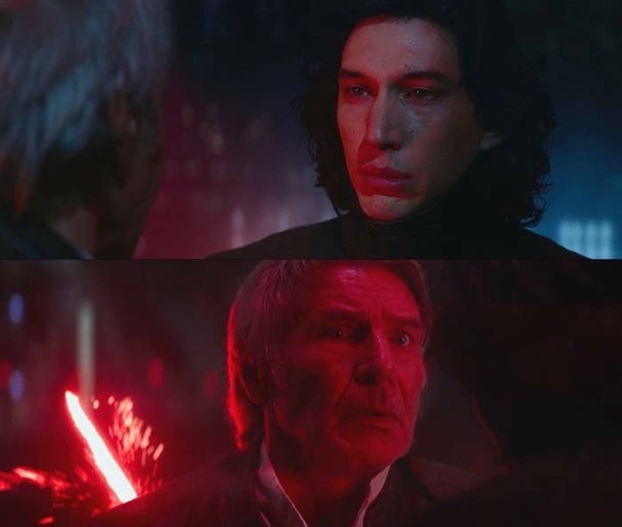 Kylo Ren stabbing Han Solo with a lightsaber with a sad look on his face; Han is shocked, but helpless