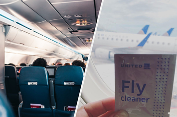 interior airplane photo; hand-sanitizing wipes being held in front of a plane window
