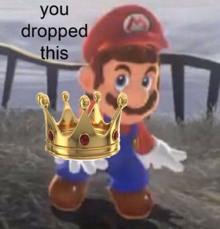 Mario from the video game Super Mario holds out a crown