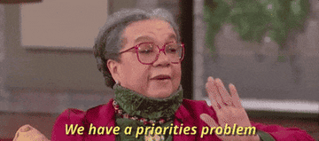 GIF of a woman saying &quot;We have a priorities problem.&quot;