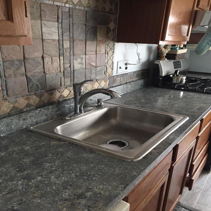 The same countertop with the granite top after using the kit
