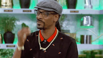 A gif of Snoop Dogg giving the chef&#x27;s kiss. 