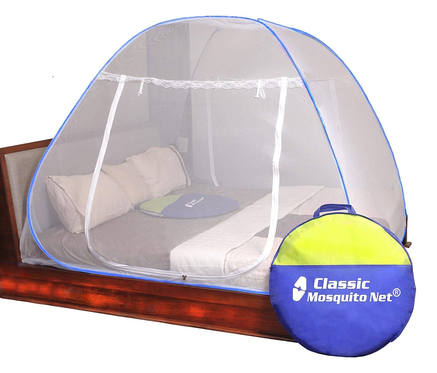 A white and blue mosquito net tented over a bed, with its storage cover next to it.