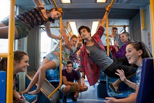 Dance Academy characters performing a dance sequence in a train carriage