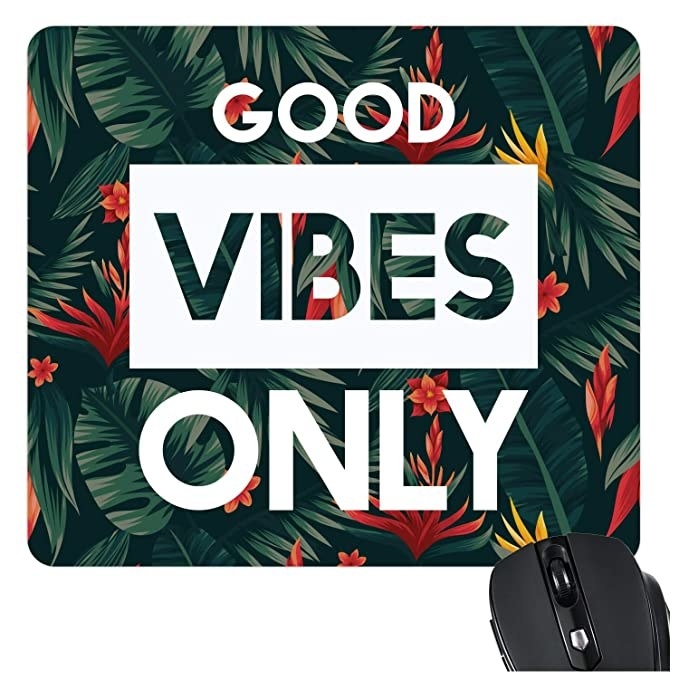 A mouse pad with a leafy design and the words &#x27;Good Vibes Only&#x27;.