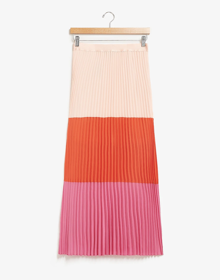 a color blocked midi skirt, the top third is blush pink, the middle is orange, and the bottom is brighter pink