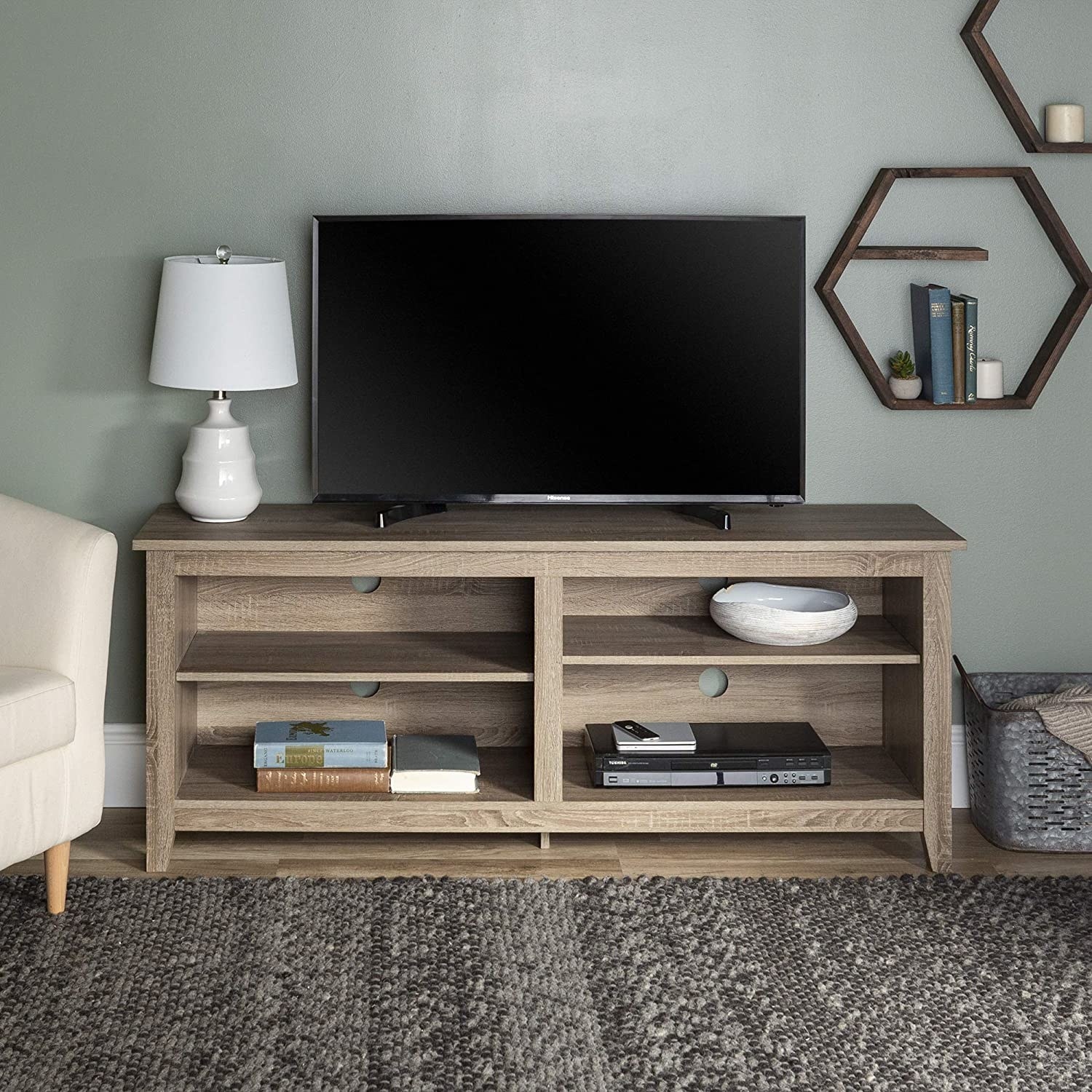 The farmhouse wood TV stand with four shelves